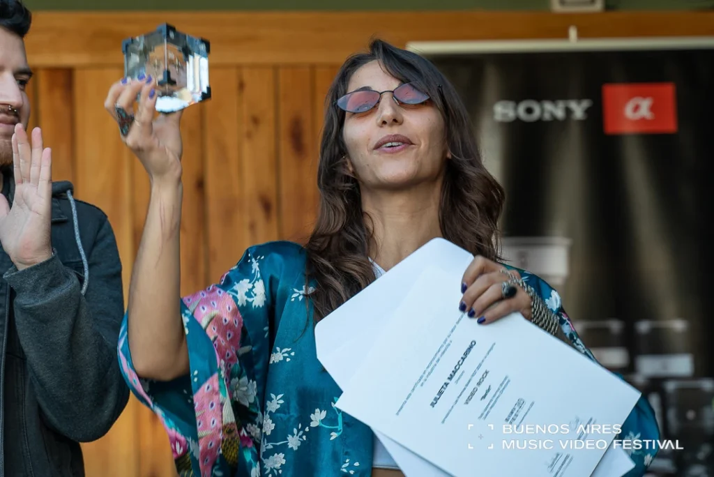 BAMV FEST RETOMA SUS ACTIVIDADES PRESENCIALES EN 2021 - Frame still del videoclip